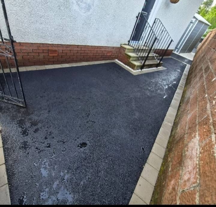 Completed side tarmac with monoblock edging